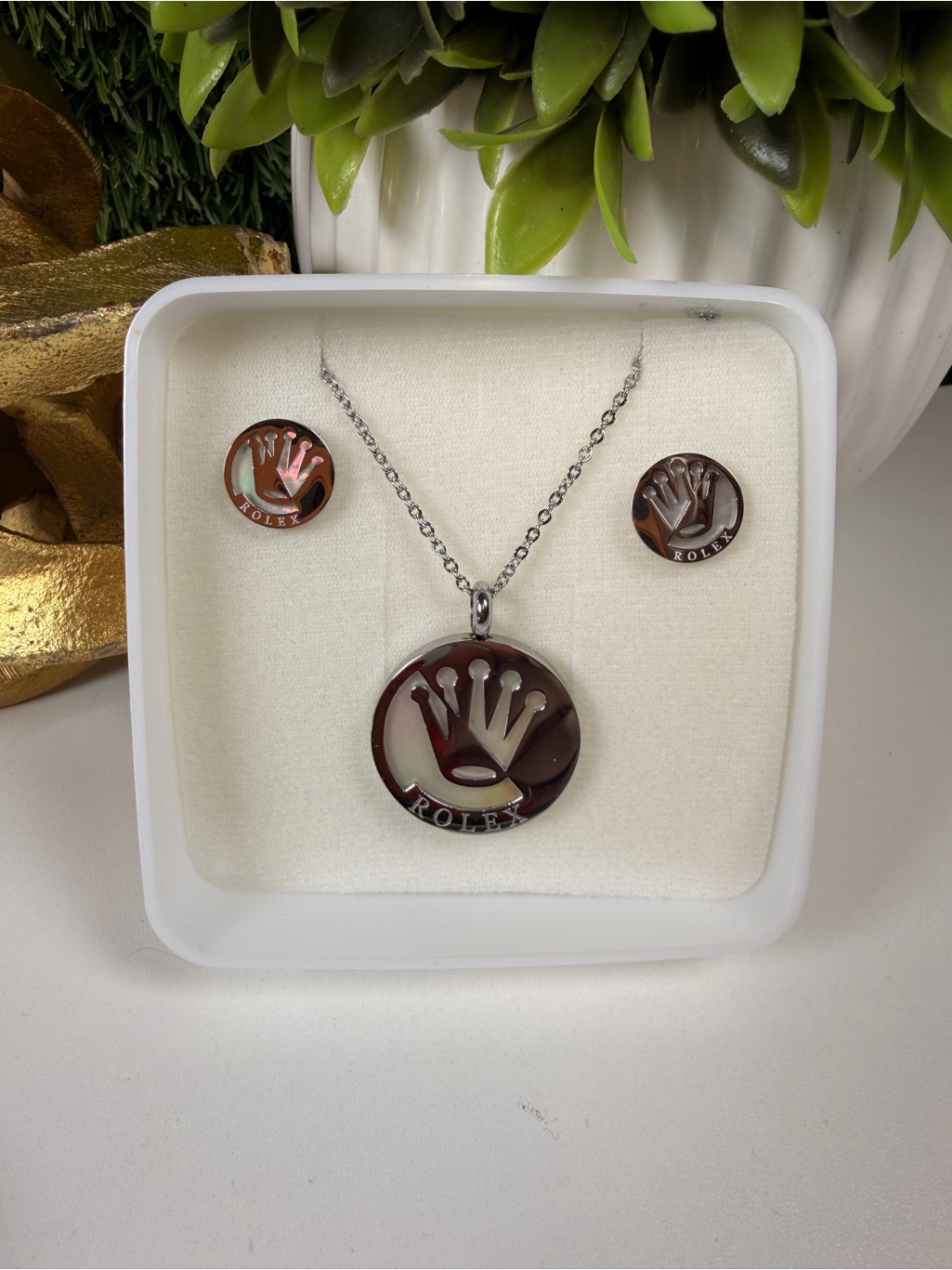rolex silver tone necklace and earring set with brown inlay